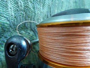 Изображение 1 : Первая намотка плетенной лески на шпулю катушки Daiwa Freams'11